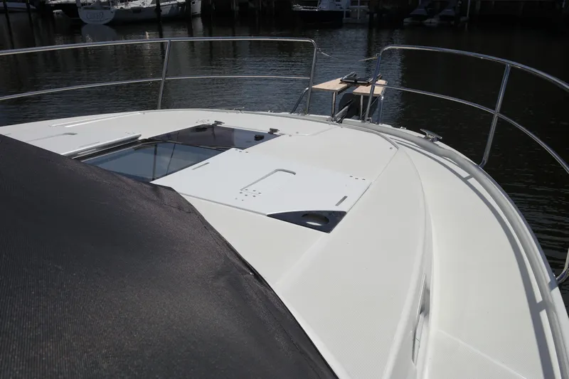  Yacht Photos Pics 2020 Jeanneau NC1095 boat deck with railing, docked at marina.