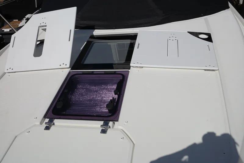  Yacht Photos Pics 2020 Jeanneau NC1095 boat deck with open hatches and windows.