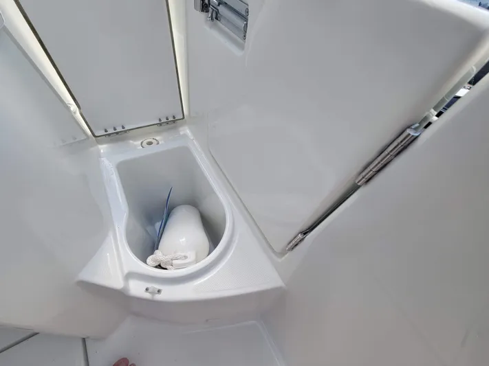  Yacht Photos Pics 2020 Jeanneau NC1095 boat toilet compartment, featuring a compact and modern design.
