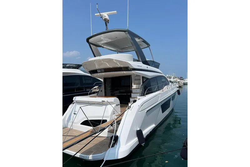  Yacht Photos Pics 2025 Azimut Fly 53 yacht docked in marina, showcasing sleek design and modern features.