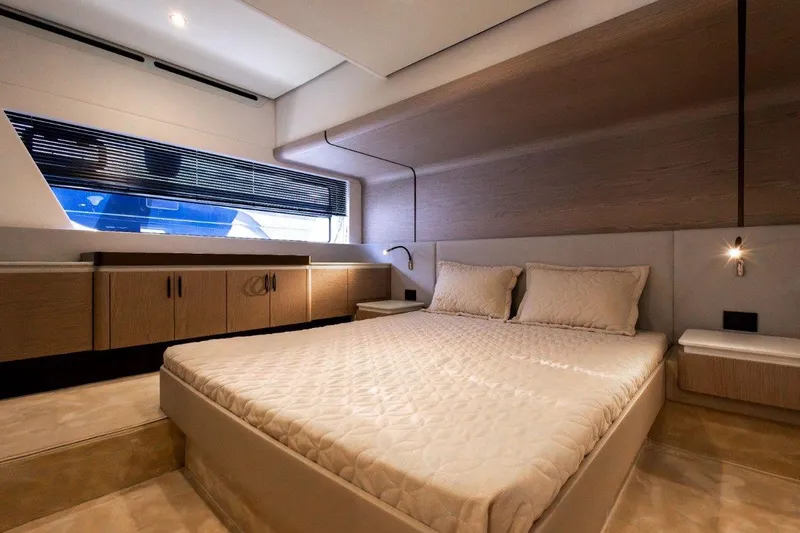  Yacht Photos Pics Luxurious bedroom interior of 2025 Azimut Fly 53 yacht with modern design.