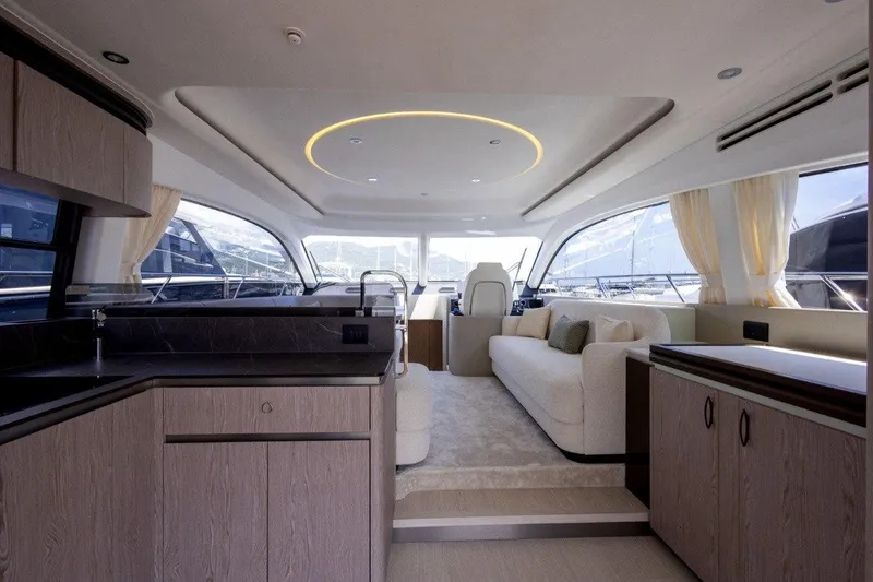  Yacht Photos Pics Luxurious interior of 2025 Azimut Fly 53 yacht with modern design and spacious seating.
