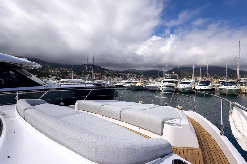  Yacht Photos Pics Luxurious 2025 Azimut Fly 53 yacht docked in a scenic marina.