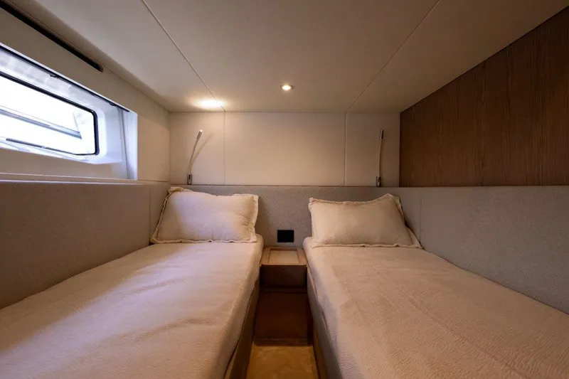  Yacht Photos Pics Interior of 2025 Azimut Fly 53 yacht with twin beds and modern design.