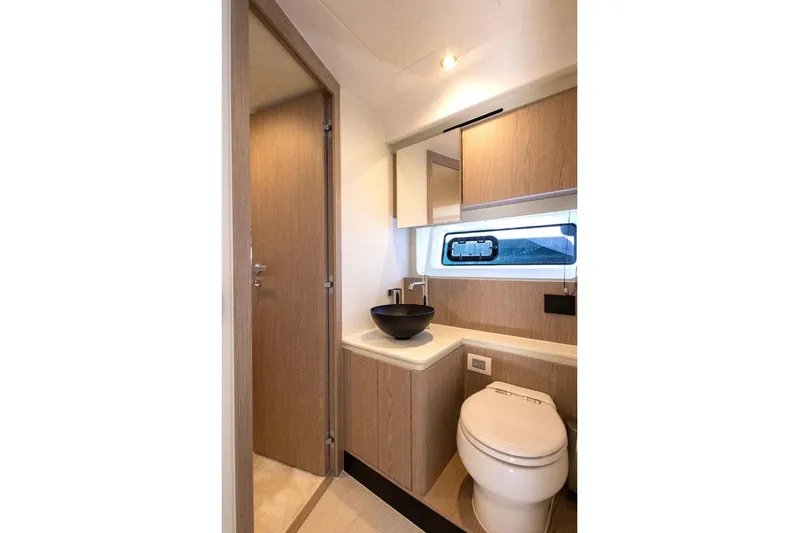 Yacht Photos Pics Luxurious bathroom interior of 2025 Azimut Fly 53 yacht with modern fixtures.