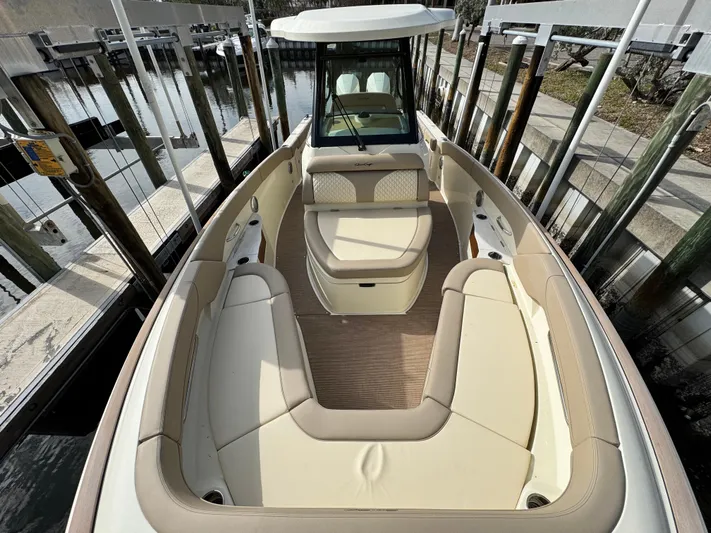  Yacht Photos Pics 2025 Chris-Craft Catalina 28 boat with spacious seating and elegant design.