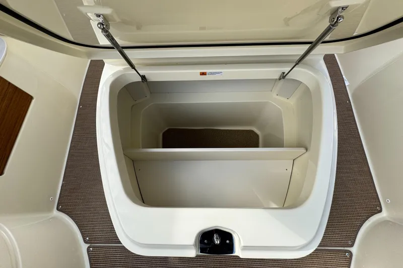  Yacht Photos Pics Open storage compartment on 2025 Chris-Craft Catalina 28 boat.