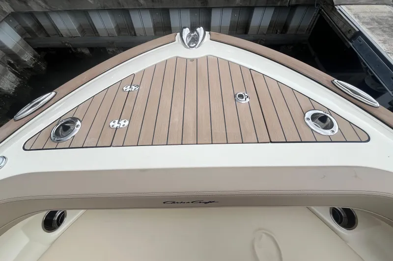  Yacht Photos Pics 2025 Chris-Craft Catalina 28 boat deck with wood finish and stainless steel fittings.