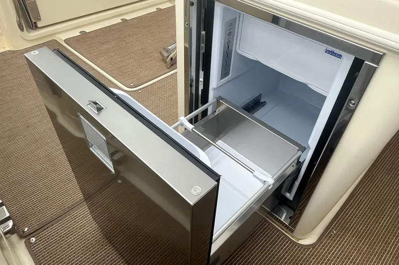  Yacht Photos Pics Stainless steel refrigerator on 2025 Chris-Craft Catalina 28 boat, open drawer view.