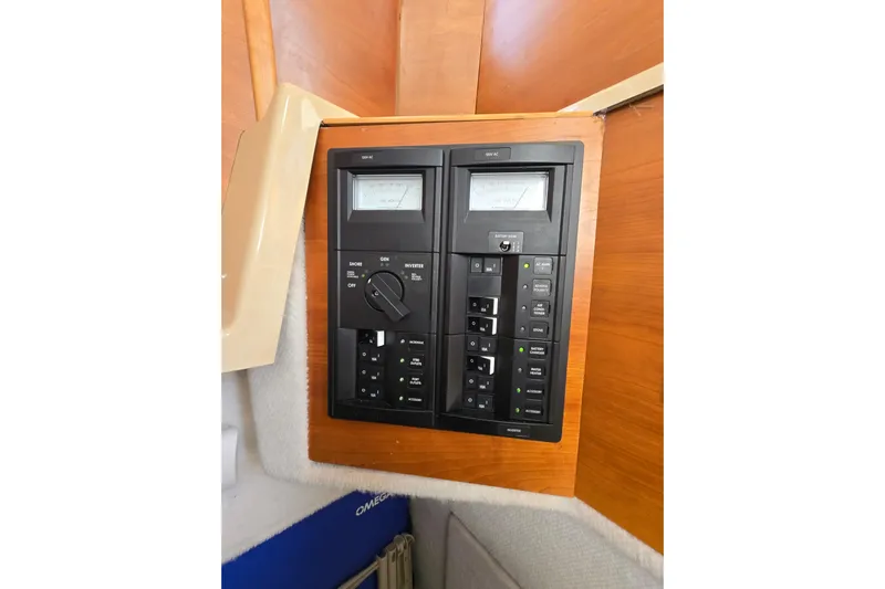  Yacht Photos Pics Electrical control panel on a 2015 Cutwater C28 boat, featuring switches and meters.