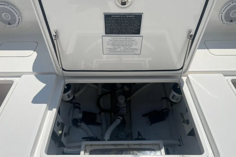  Yacht Photos Pics 2018 Invincible 36 Open Fisherman boat compartment with open hatch and visible components.