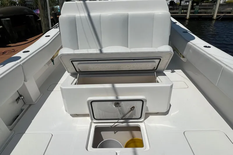  Yacht Photos Pics 2018 Invincible 36 Open Fisherman boat interior with open storage compartments.