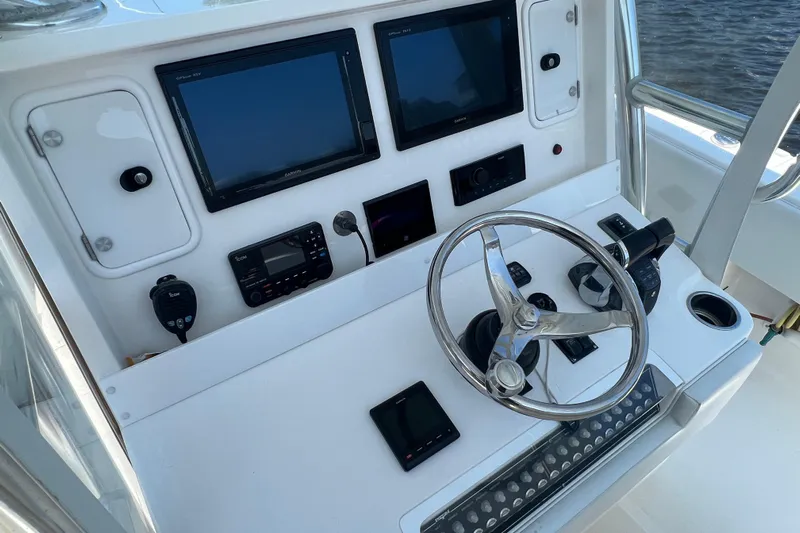  Yacht Photos Pics Helm of 2018 Invincible 36 Open Fisherman with dual screens and controls.