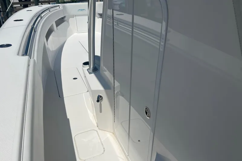  Yacht Photos Pics 2018 Invincible 36 Open Fisherman boat interior, showcasing sleek design and spacious deck.