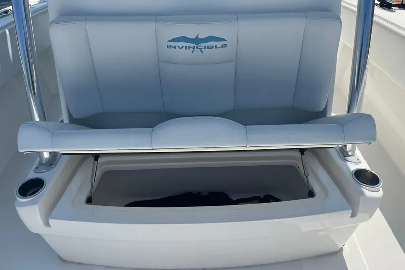  Yacht Photos Pics 2018 Invincible 36 Open Fisherman boat seat with storage compartment open.