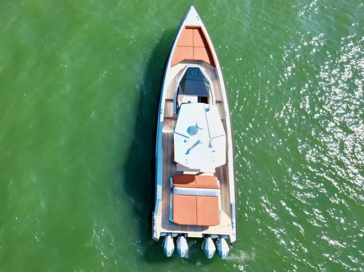 Argento Yacht Photos Pics Aerial view of 2023 Wally 48 X yacht on green water.