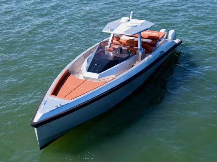 Argento Yacht Photos Pics 2023 Wally 48 X luxury yacht on calm water, featuring sleek design and spacious deck.