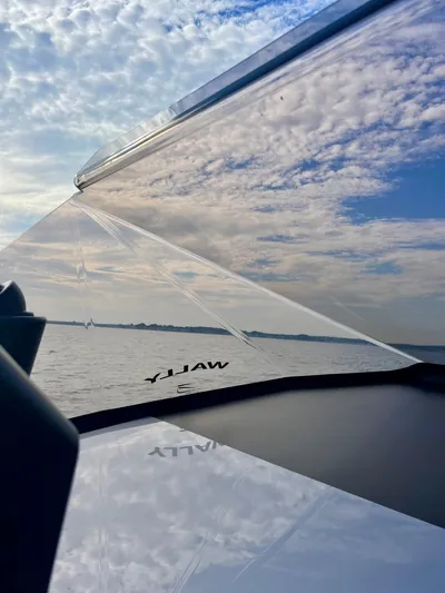 Argento Yacht Photos Pics Wally 48 X yacht on open water under a partly cloudy sky, 2023 model.