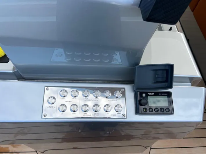 Argento Yacht Photos Pics Control panel of 2023 Wally 48 X yacht with buttons and Fusion MS NRX300 display.