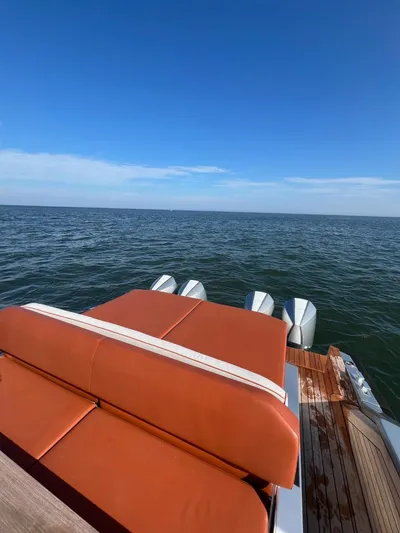 Argento Yacht Photos Pics Luxury Wally 48 X yacht with leather seating, ocean view, and clear blue sky.