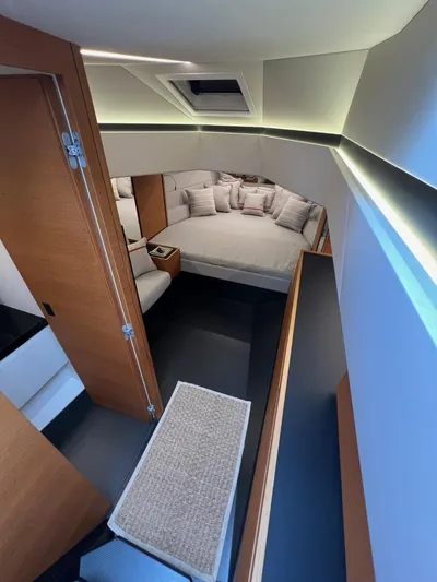 Argento Yacht Photos Pics Luxurious interior of 2023 Wally 48 X yacht with modern design and cozy sleeping area.