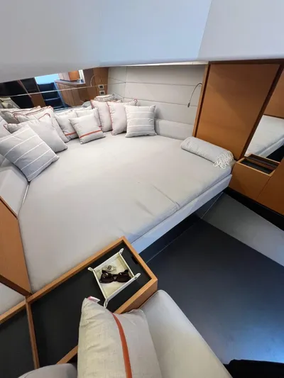 Argento Yacht Photos Pics Luxurious interior of 2023 Wally 48 X yacht with plush bedding and modern design.