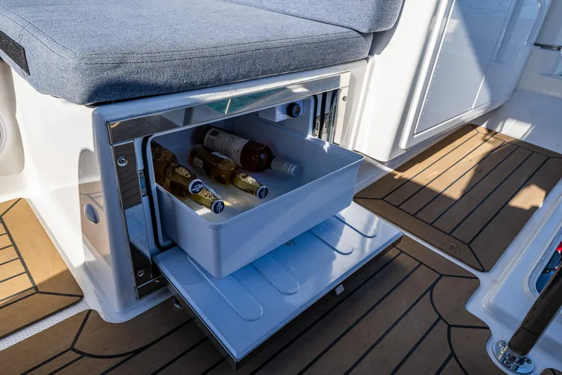 Endeavour Yacht Photos Pics Built-in cooler with drinks on the 2023 Nimbus 405 Flybridge yacht deck.
