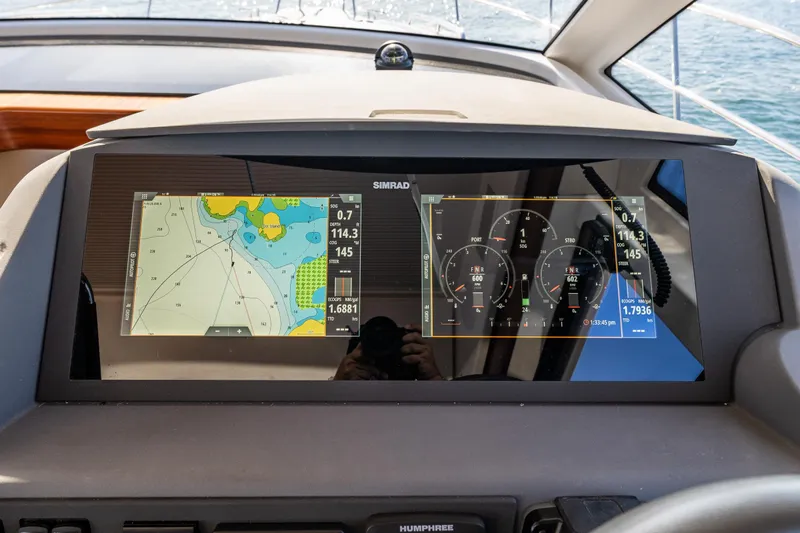 Endeavour Yacht Photos Pics Dashboard of 2023 Nimbus 405 Flybridge with navigation and engine displays.