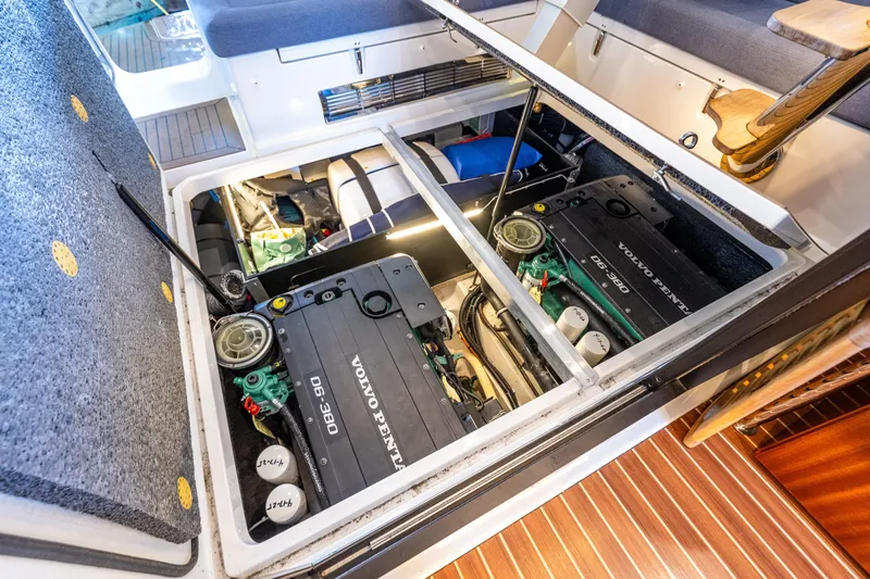 Endeavour Yacht Photos Pics Engine compartment of 2023 Nimbus 405 Flybridge with Volvo Penta engines, showcasing modern marine engineering.