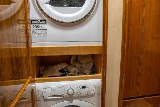 No Collars Yacht Photos Pics 2015 Viking 66 No Collars - Stateroom, stacked washer and dryer