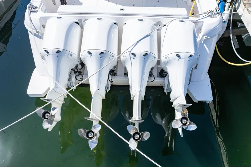  Yacht Photos Pics 2018 Intrepid 475 Sport Yacht with four powerful outboard engines docked.