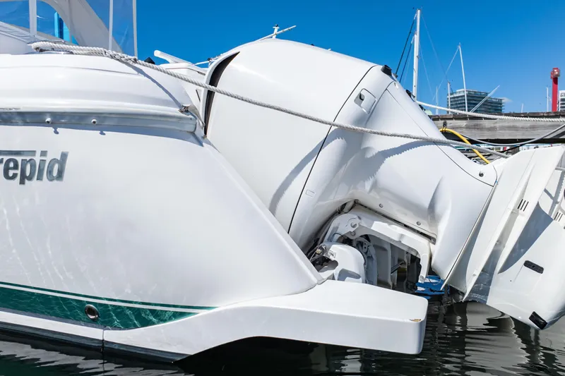  Yacht Photos Pics 2018 Intrepid 475 Sport Yacht with powerful outboard engines docked at marina.
