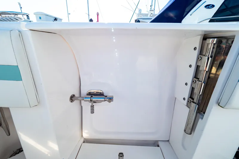  Yacht Photos Pics 2018 Intrepid 475 Sport Yacht, white interior detail with stainless steel fixtures.