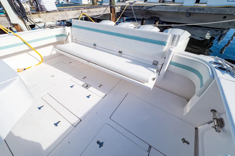  Yacht Photos Pics 2018 Intrepid 475 Sport Yacht deck with seating and storage compartments.