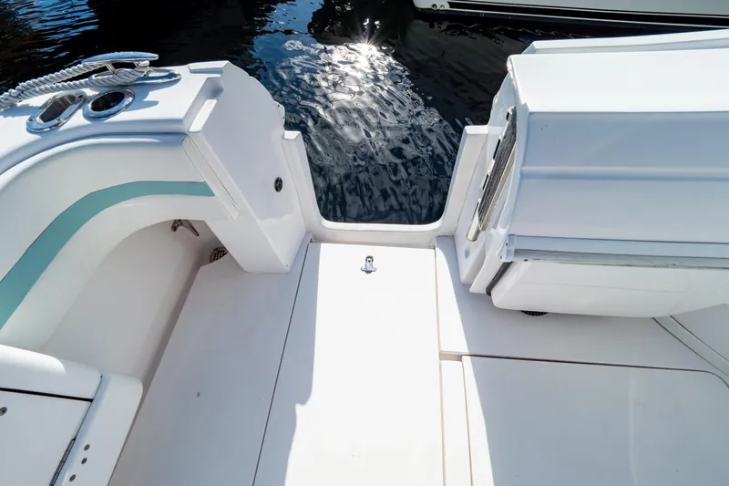  Yacht Photos Pics 2018 Intrepid 475 Sport Yacht deck with water view and sleek design.