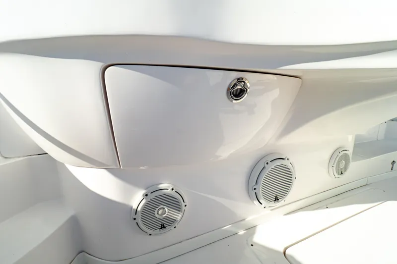  Yacht Photos Pics 2018 Intrepid 475 Sport Yacht interior detail with speakers and storage compartment.