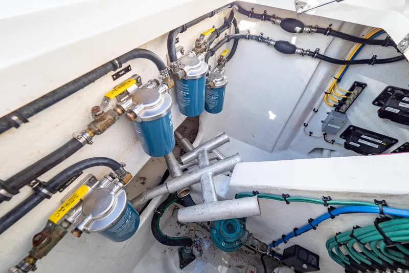  Yacht Photos Pics Engine compartment of 2018 Intrepid 475 Sport Yacht with fuel filters and wiring.