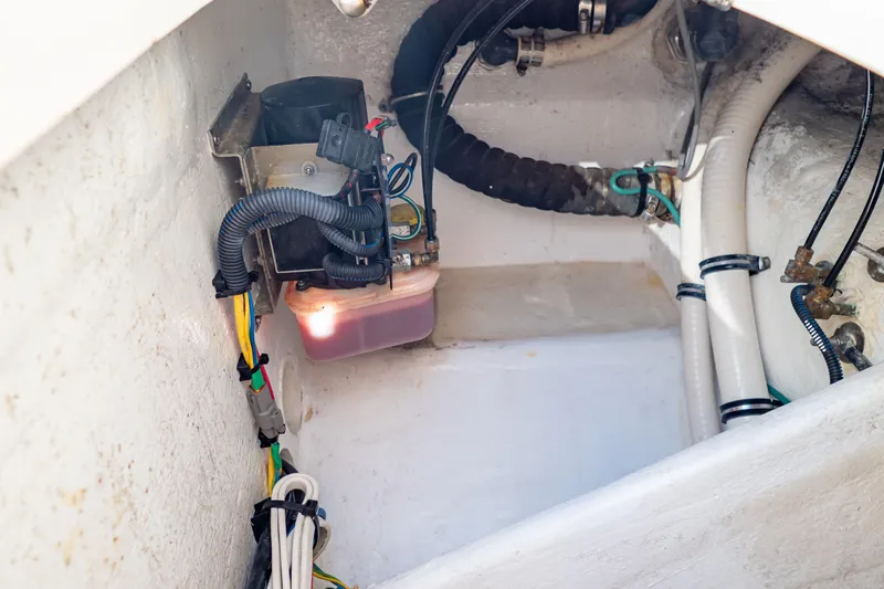  Yacht Photos Pics Engine compartment of a 2018 Intrepid 475 Sport Yacht, showing wiring and components.