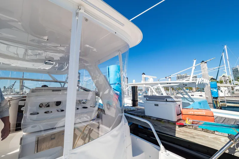  Yacht Photos Pics 2018 Intrepid 475 Sport Yacht docked, showcasing sleek design and modern features.