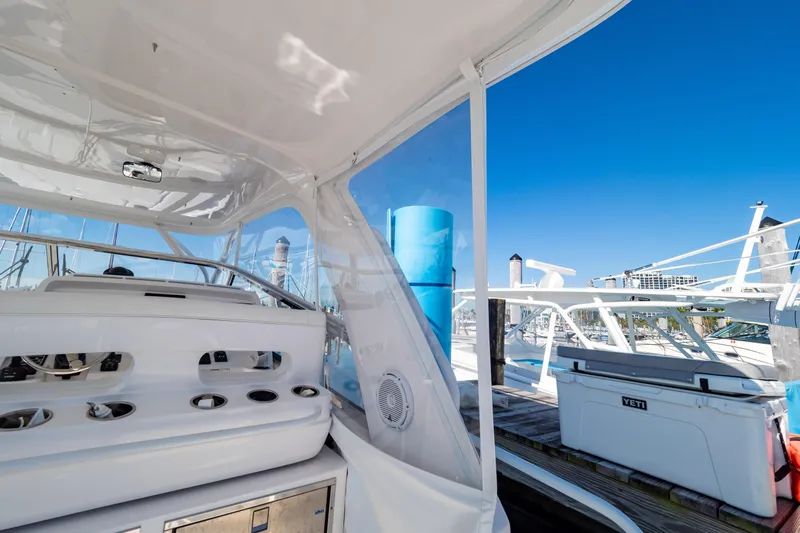  Yacht Photos Pics 2018 Intrepid 475 Sport Yacht interior with marina view, featuring sleek design and modern amenities.