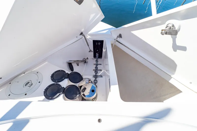  Yacht Photos Pics Anchor compartment of 2018 Intrepid 475 Sport Yacht with open hatches and chain.