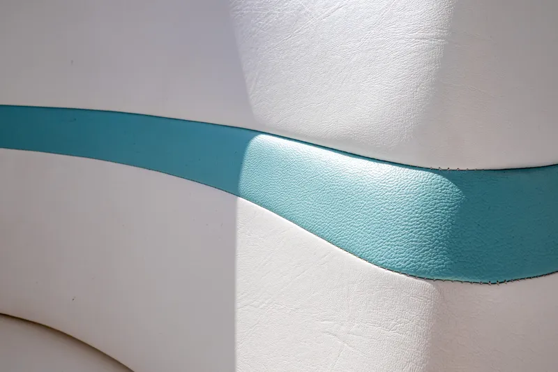  Yacht Photos Pics White and teal upholstery detail on 2018 Intrepid 475 Sport Yacht.
