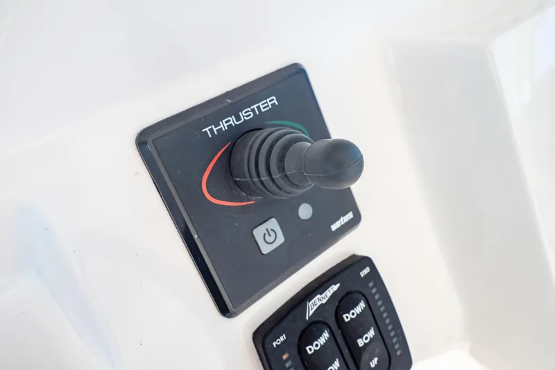  Yacht Photos Pics Joystick control panel on 2018 Intrepid 475 Sport Yacht, featuring thruster and trim tab controls.