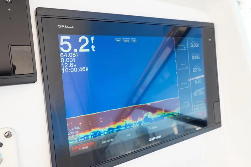  Yacht Photos Pics Garmin GPS display on 2018 Intrepid 475 Sport Yacht showing depth and temperature.