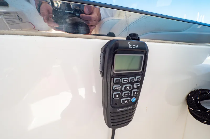  Yacht Photos Pics ICOM CommandMic on 2018 Intrepid 475 Sport Yacht, mounted on white panel.