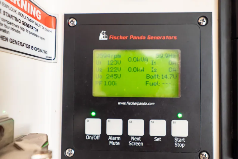  Yacht Photos Pics Fischer Panda generator display on 2018 Intrepid 475 Sport Yacht, showing voltage and battery status.