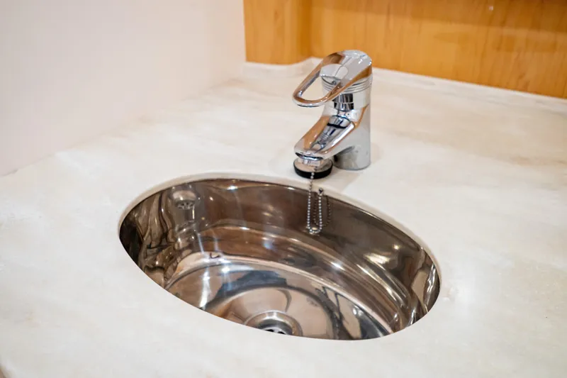  Yacht Photos Pics Stainless steel sink and faucet on 2018 Intrepid 475 Sport Yacht.