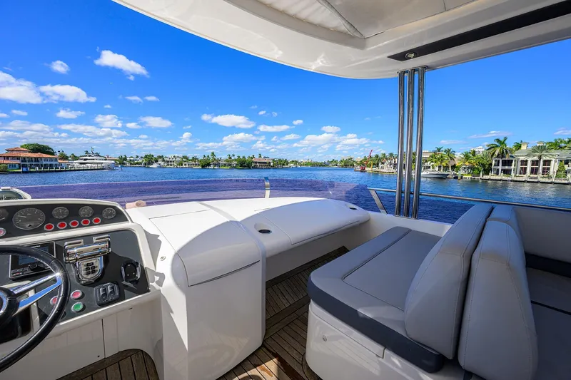 Tight Squeeze Yacht Photos Pics Luxurious 2016 Princess F64 yacht interior with scenic waterfront view.