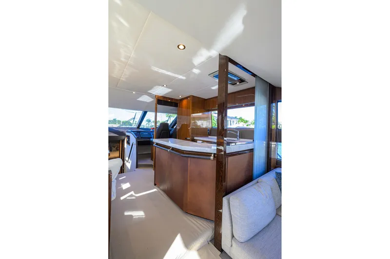 Tight Squeeze Yacht Photos Pics Luxurious interior of 2016 Princess F64 yacht with modern design and elegant furnishings.