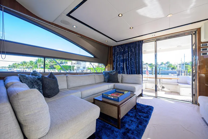 Tight Squeeze Yacht Photos Pics Luxurious interior of 2016 Princess F64 yacht with plush seating and scenic views.